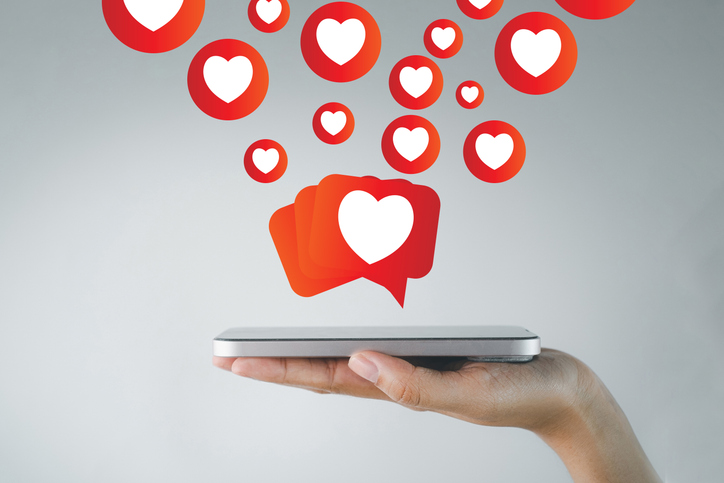 social-media-engagement-receiving-likes-and-positive-feedback-on-smartphone